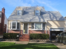 Before image of siding and windows
