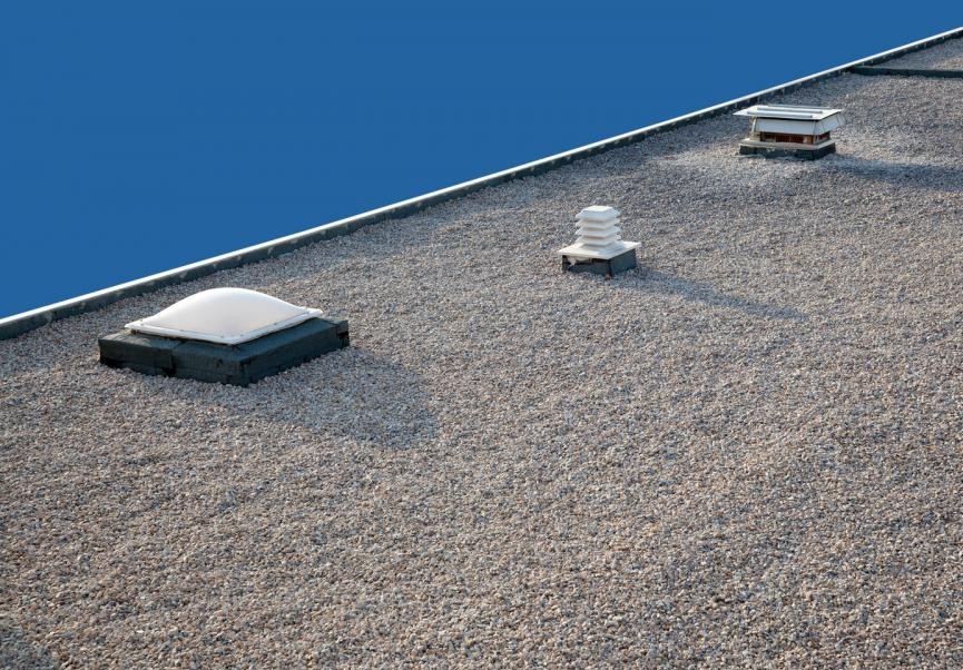 inverted-gravel-roof-chimney-and-skylight
